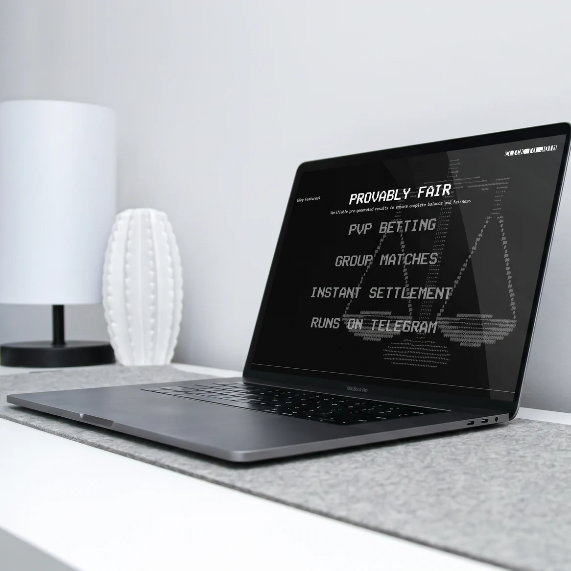 Gambull website: Laptop on a white desk showing the Gambull key features: provably fair, PvP betting, group matches, instant settlement